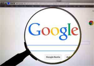 Google with magnifying glass 